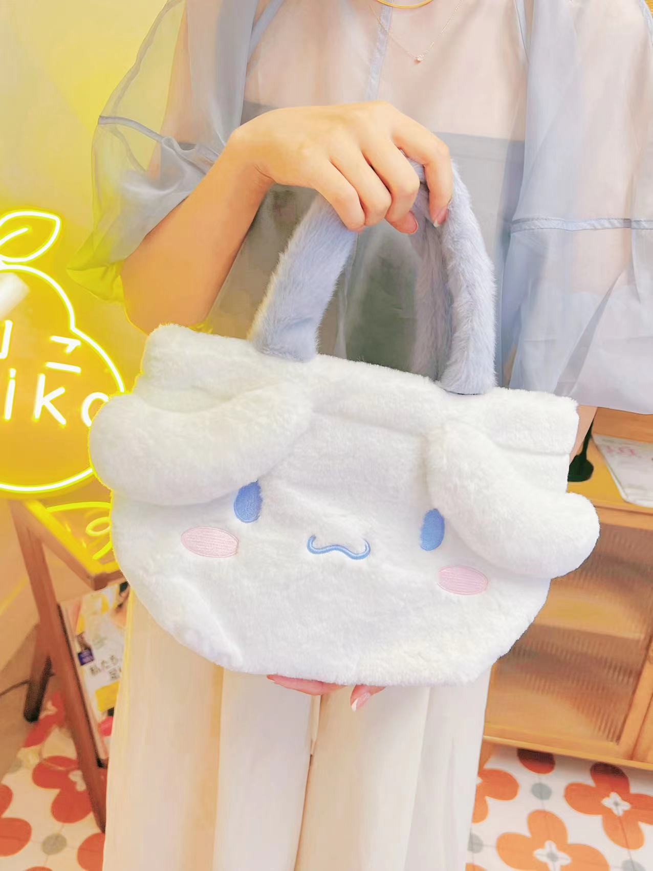 日本 SANRIO 三丽鸥 毛绒手拿包/收纳包